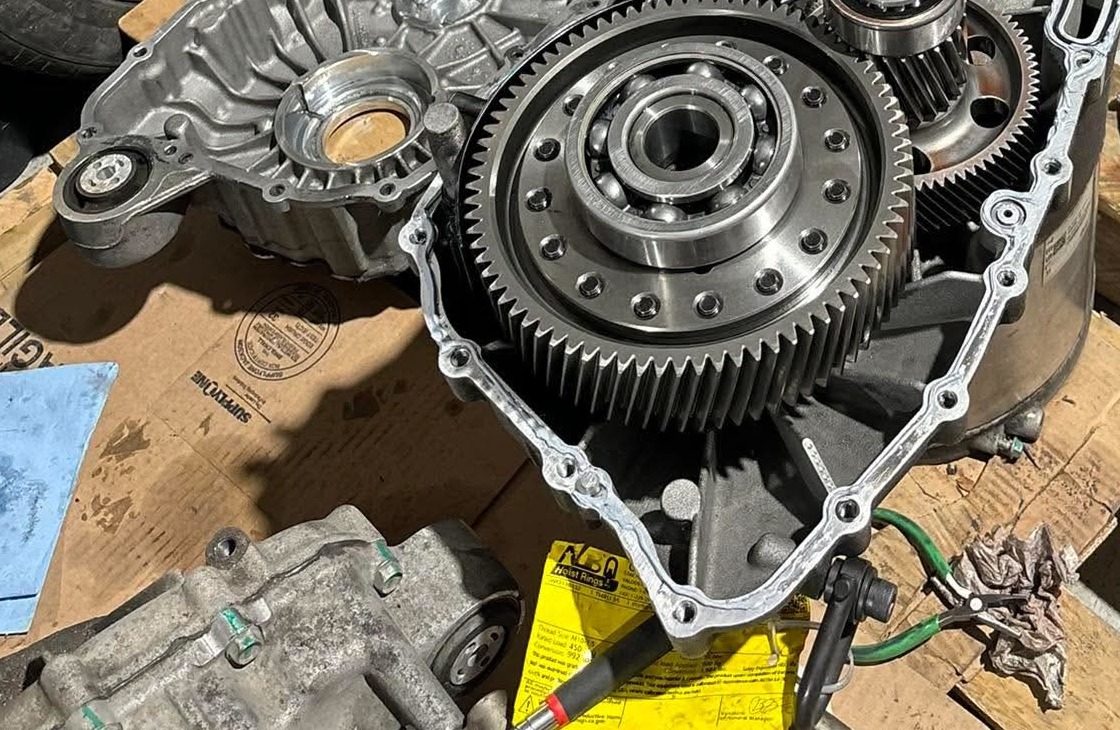 Opened drive unit with exposed reduction gears and bearings